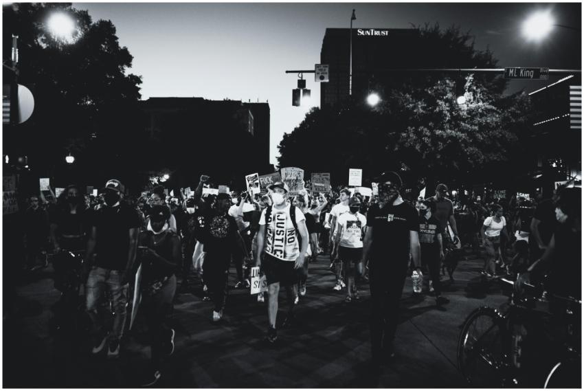 Black and white photo of a large protest march on