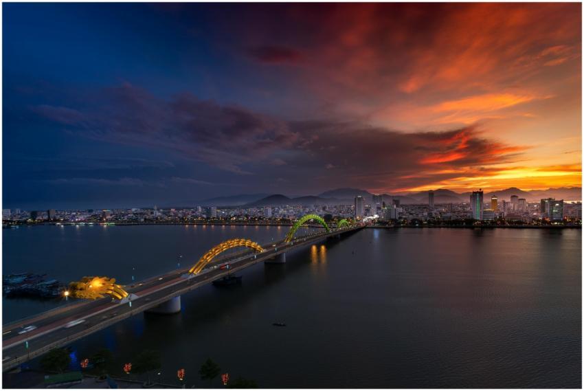 A breathtaking view of a city skyline with a lit-u