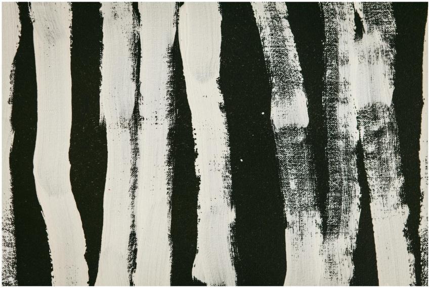 Abstract painting with bold black and white brush
