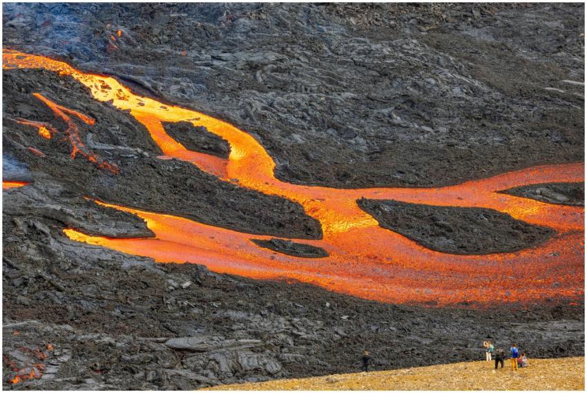 A vibrant lava flow captivating tourists in a dram
