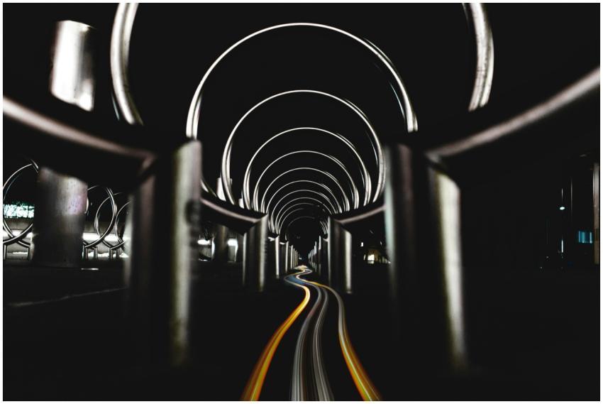 Abstract view of an urban tunnel at night with dyn