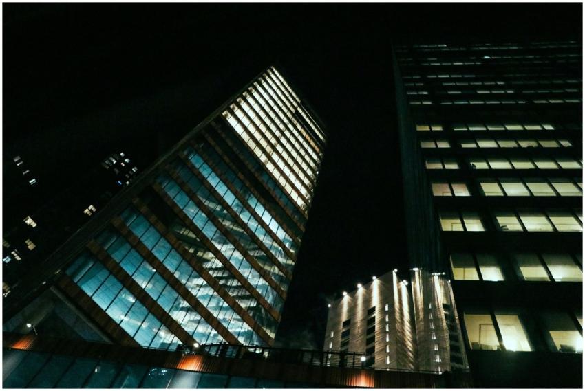 Low angle shot of illuminated skyscrapers at night