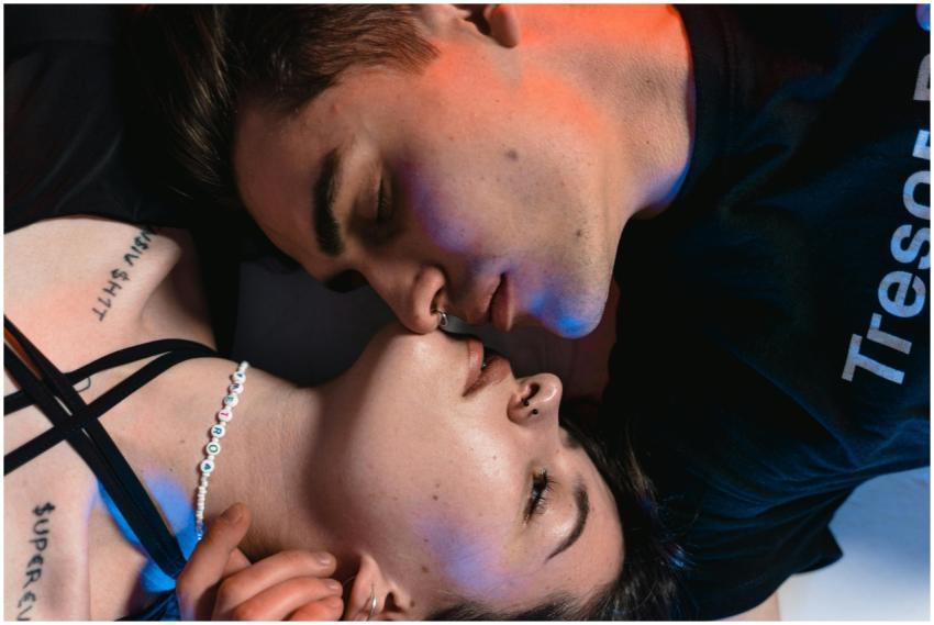 A young couple shares an intimate moment in a mood