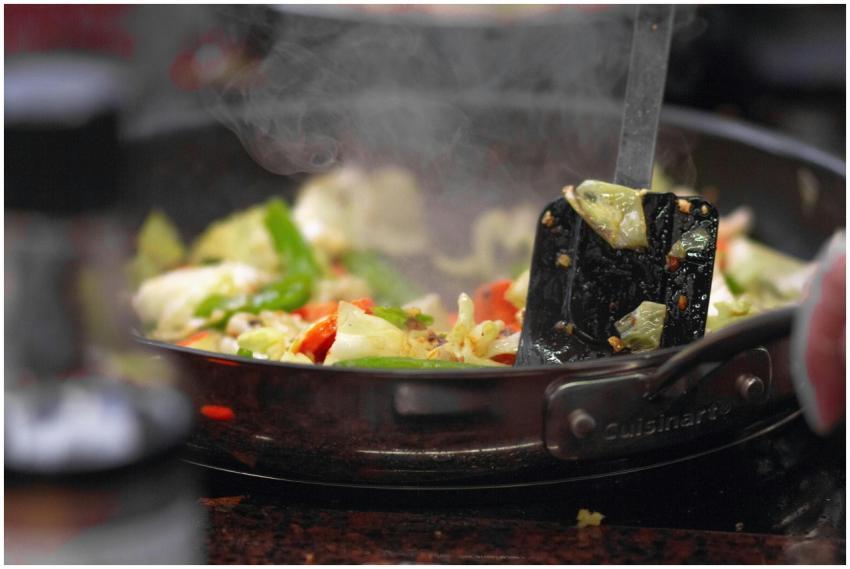 A vibrant stir fry of fresh vegetables sizzling in
