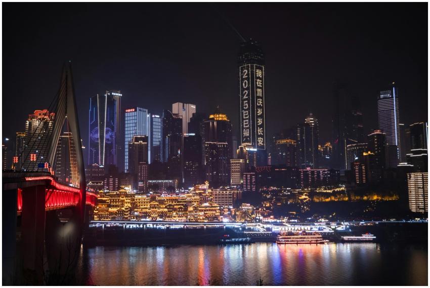 Chongqing cityscape at night featuring lit modern