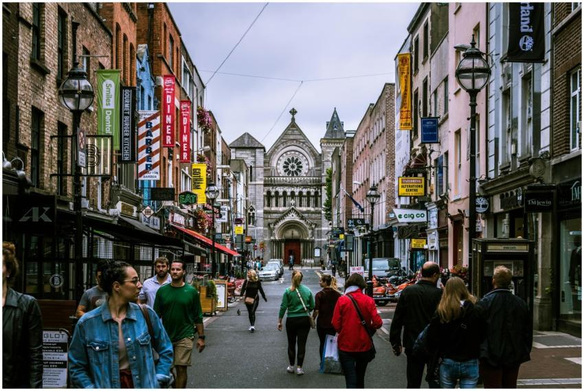 A bustling street scene in Dublin, showcasing dive