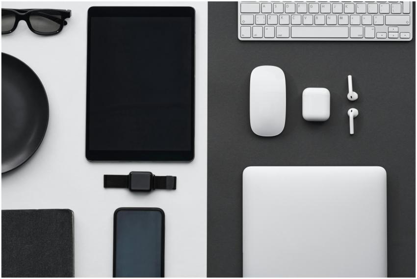 Stylish flatlay of modern tech gadgets including t