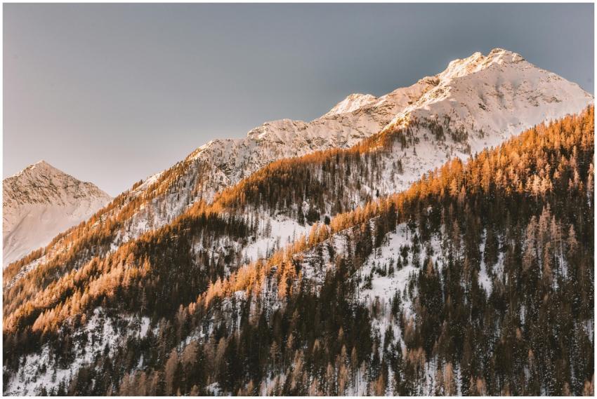 Stunning view of a snow-covered mountain peak surr