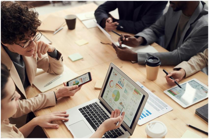 A multicultural team discussing analytics and stra