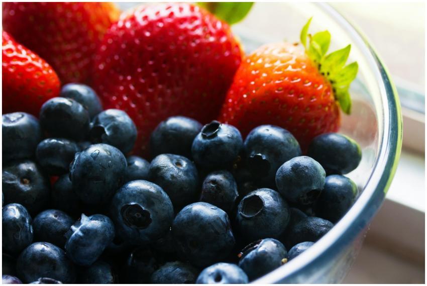 Close-up of fresh blueberries and strawberries in