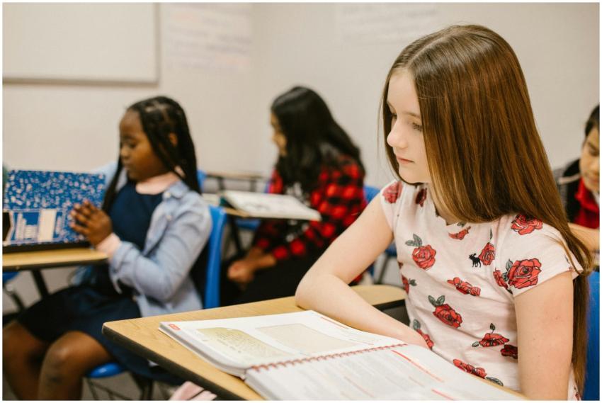 Diverse group of children studying in a classroom