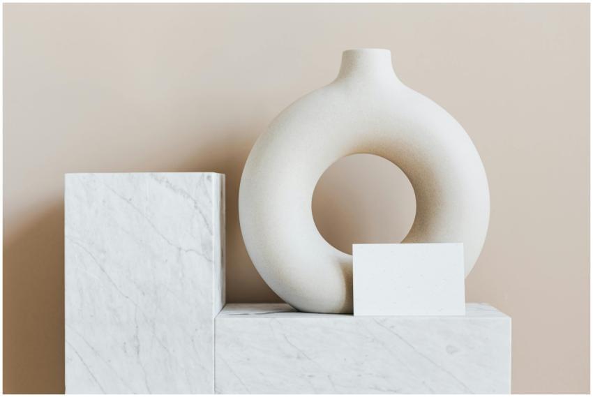 Composition of creative white ceramic vase in ring