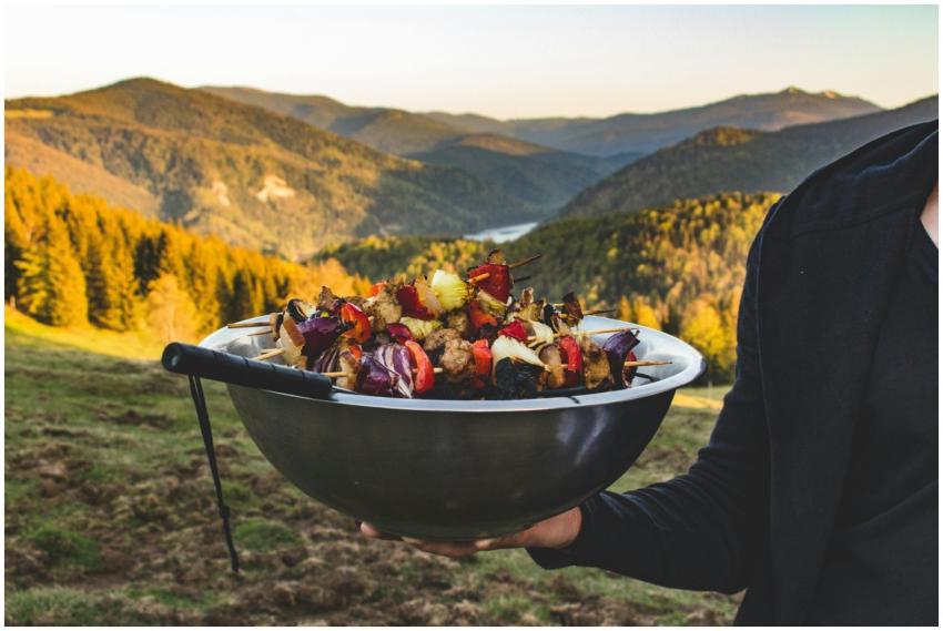 Enjoying a vibrant barbecue with stunning mountain
