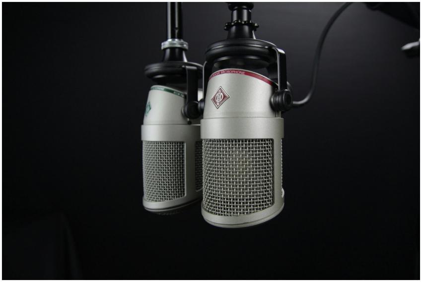 Close-up of two professional microphones in a reco
