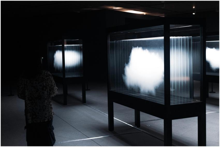 Abstract cloud display in a dimly lit room with a