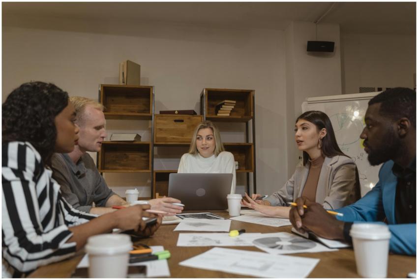 Group of professionals collaborating in a modern o