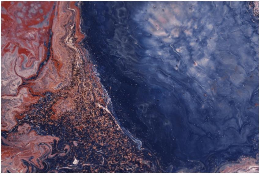 Dynamic abstract painting featuring deep blue and