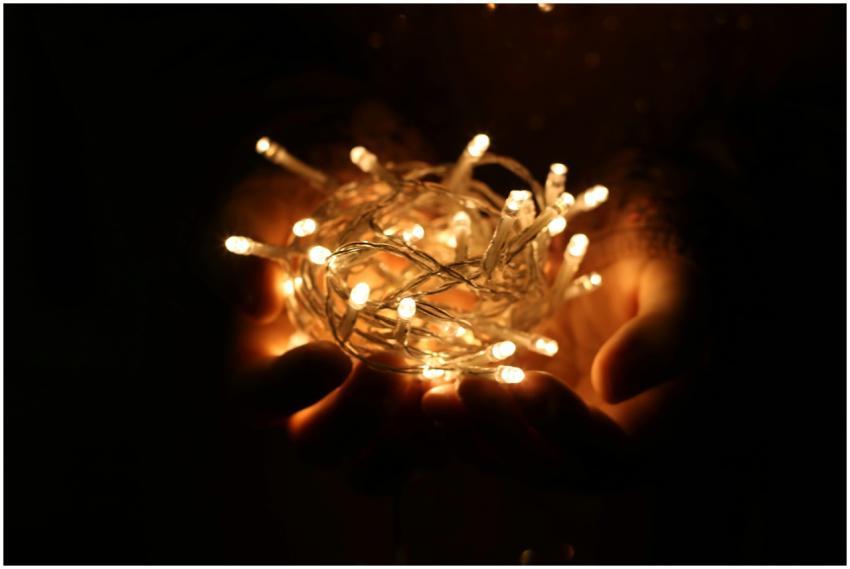 Cozy Christmas decoration with glowing string ligh