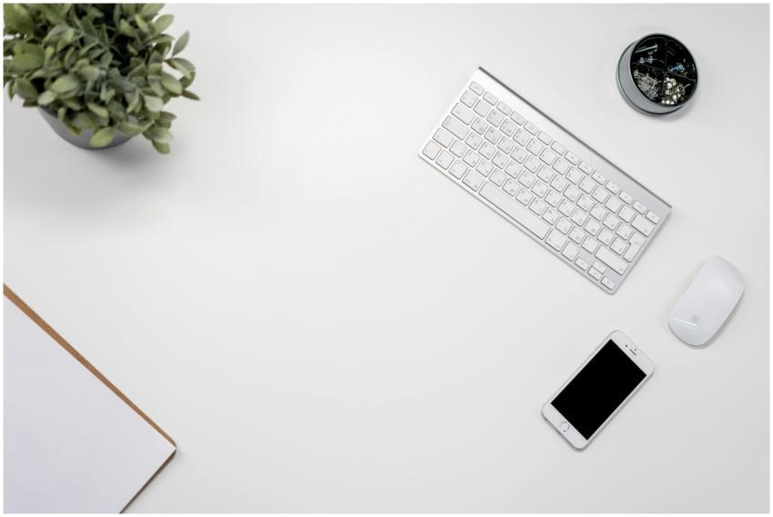 A neat and organized home office setup with a wire