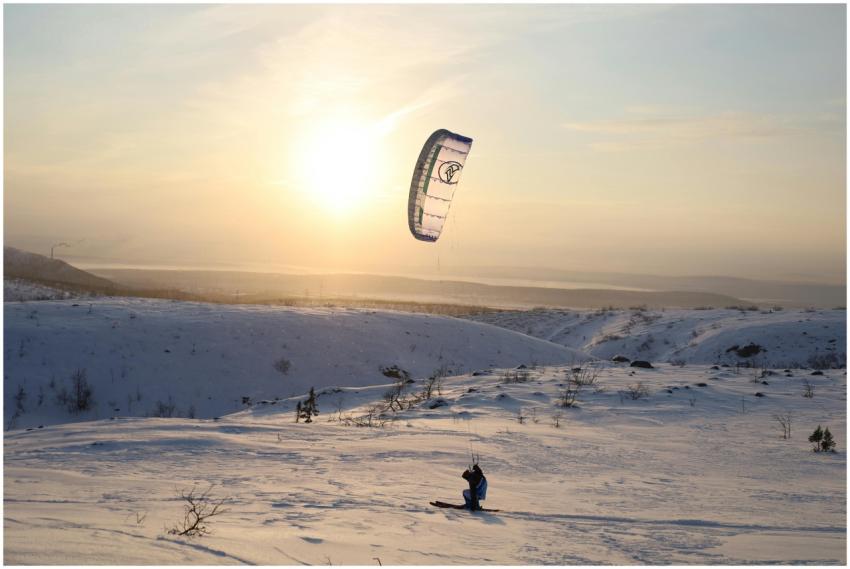 Experience the thrill of kiteboarding against a wi