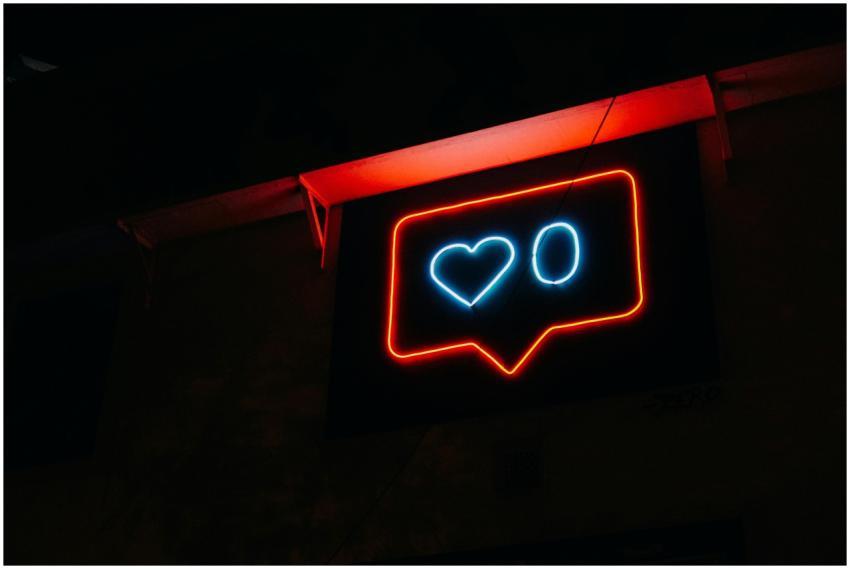 Bright neon heart icon with zero likes, symbolizin