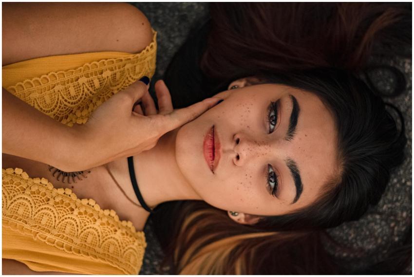 Portrait of a woman in yellow dress, showcasing na