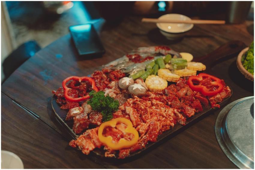 A colorful close-up of a meat and vegetable platte