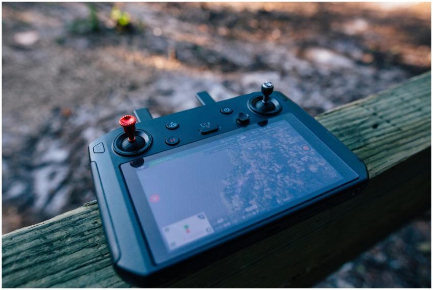 Close-up of a drone controller with visible screen