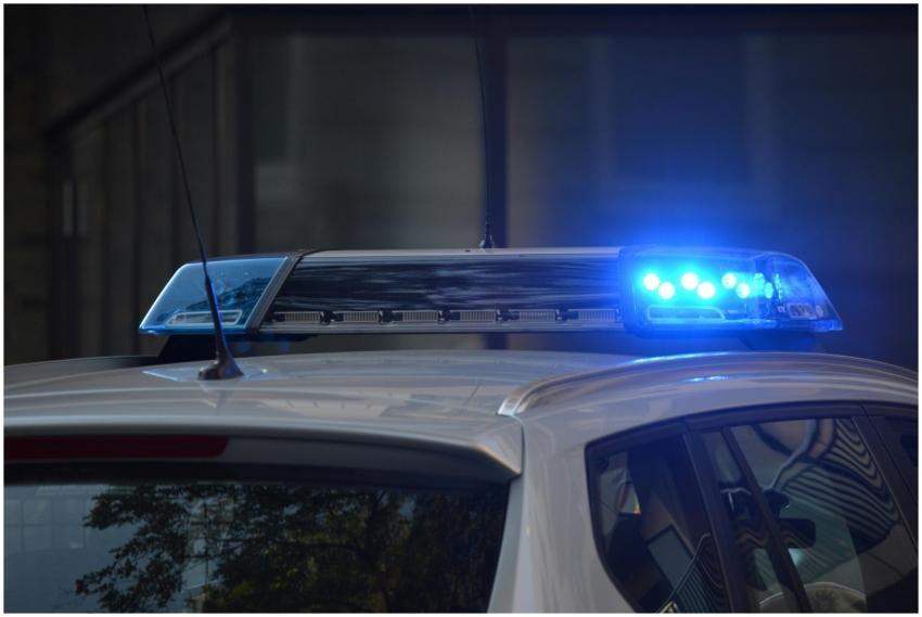 Close-up of a police car's flashing blue lights in