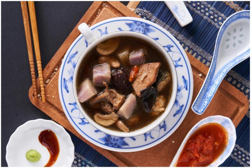 Appetizing Chinese soup with mushrooms, tofu, and