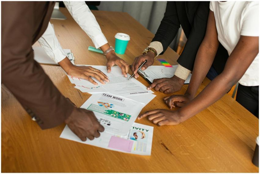A diverse group of professionals actively discussi