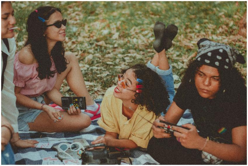 Group of friends enjoying a fun picnic with games
