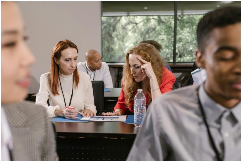 Business professionals engaged in discussion at an