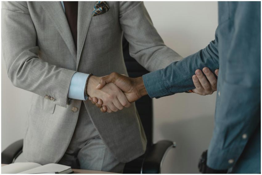 Image of a professional handshake between two busi