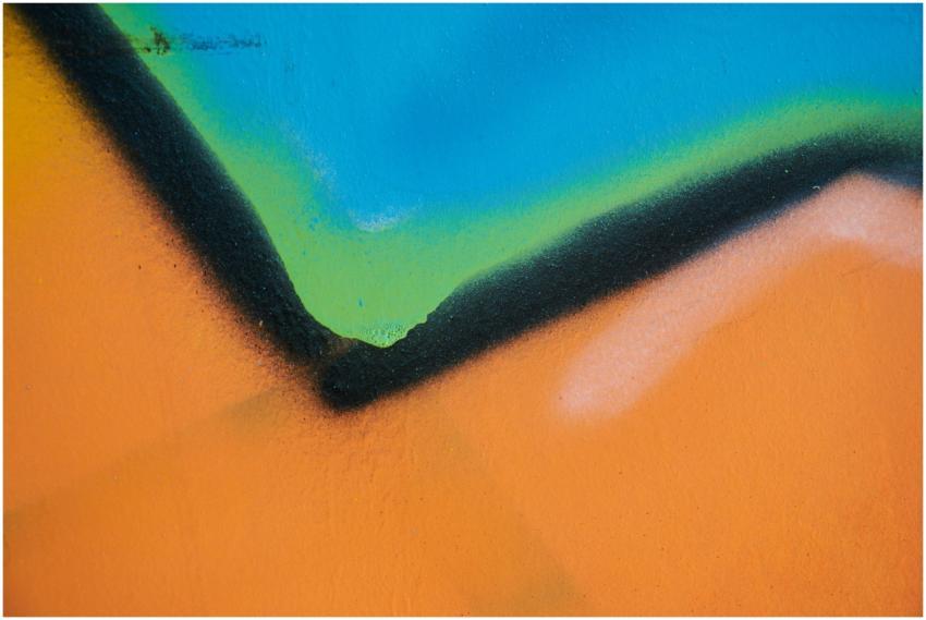 Close-up of vibrant abstract street art with bold