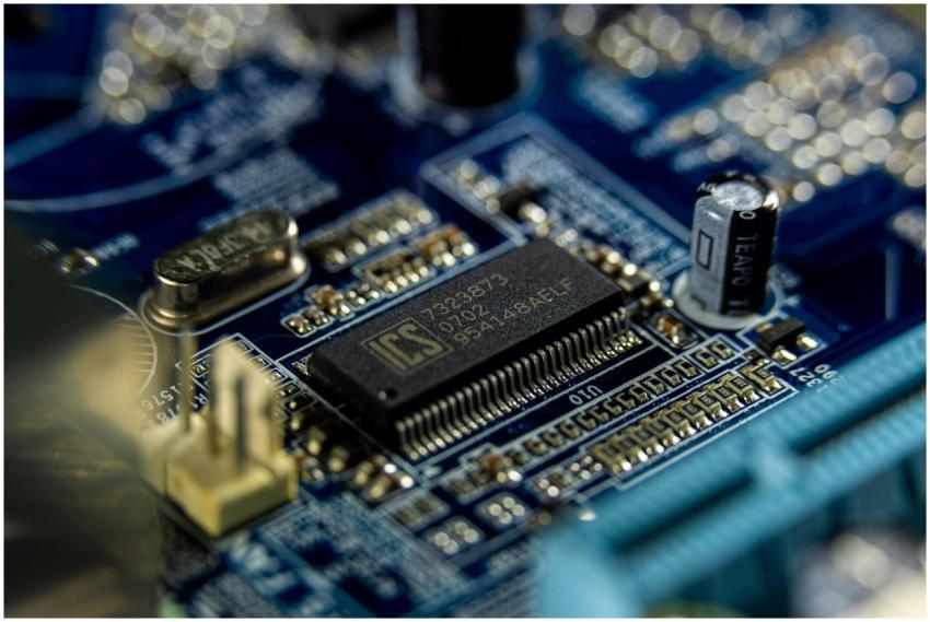 Detailed shot of a microprocessor on a blue mother