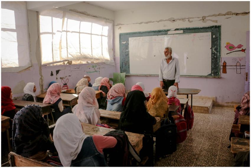 A classroom in Idlib, Syria, captures a teacher en