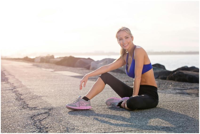Smiling woman exercising on the Gold Coast, Austra