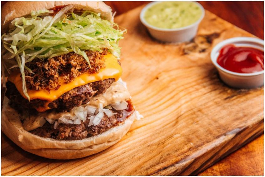 Close-up of a delicious double cheeseburger with t