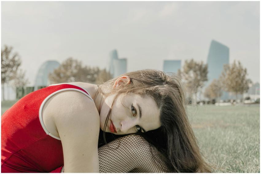 Contemplative Woman Red Dress