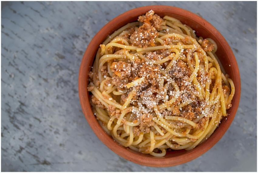 Delicious homemade spaghetti with meat sauce and p