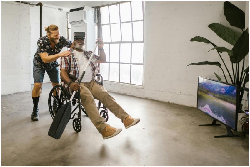 Two men enjoy virtual reality gaming indoors, emph