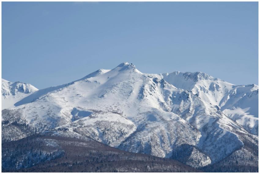 Explore the serene beauty of the snow-capped Asahi