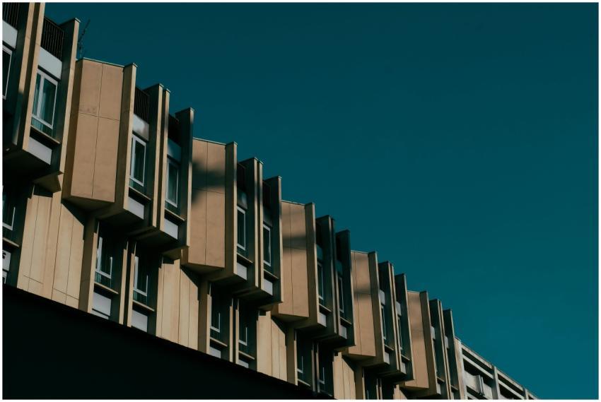 Low angle shot of modern urban building facade wit
