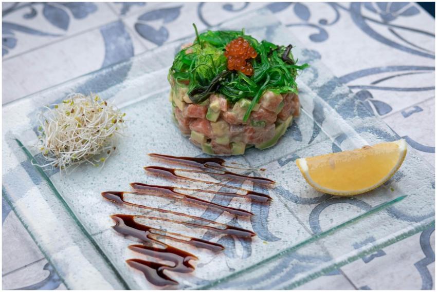 Elegant salmon and avocado tartare with seaweed an