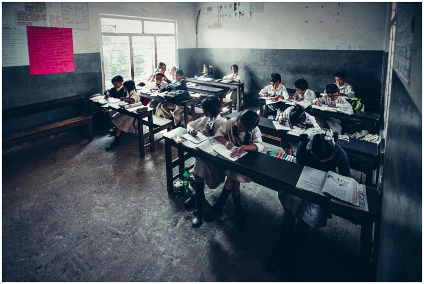 Students engaged in focused learning inside a prim