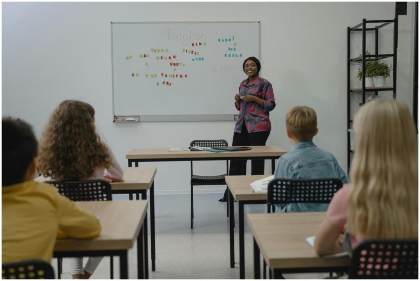 A diverse group of students in an English class wi