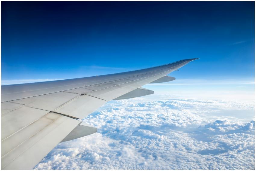 Stunning view from an airplane wing flying above t