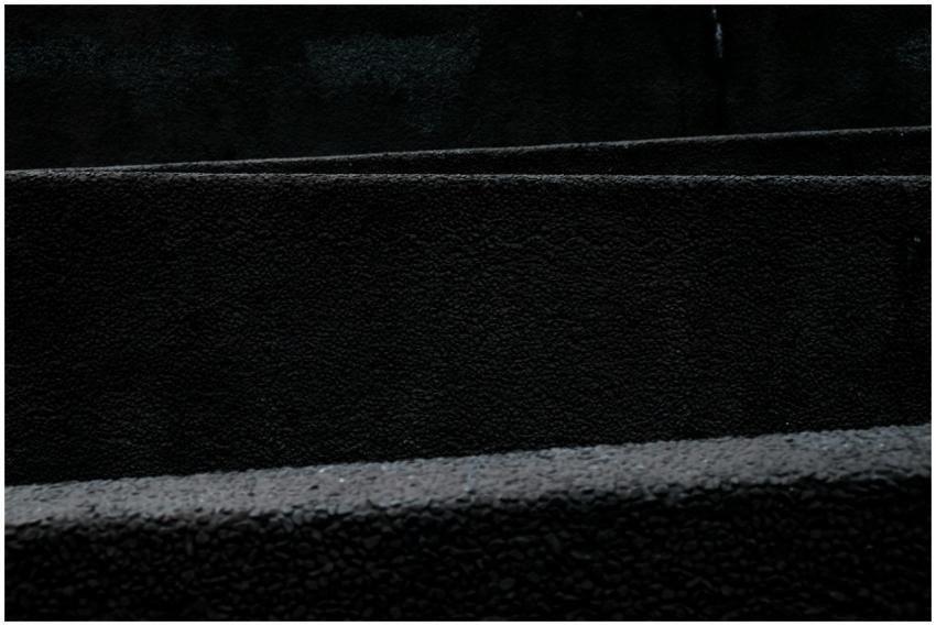 A dark and minimalist black texture pattern ideal