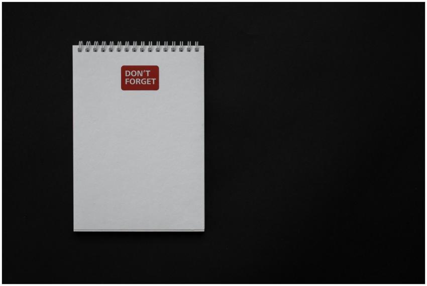 Simple minimalist notepad on black background with